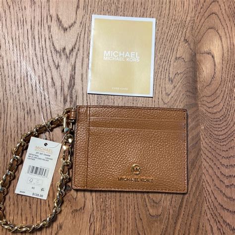 license holder michael kors|Small Pebbled Leather Chain Card Case .